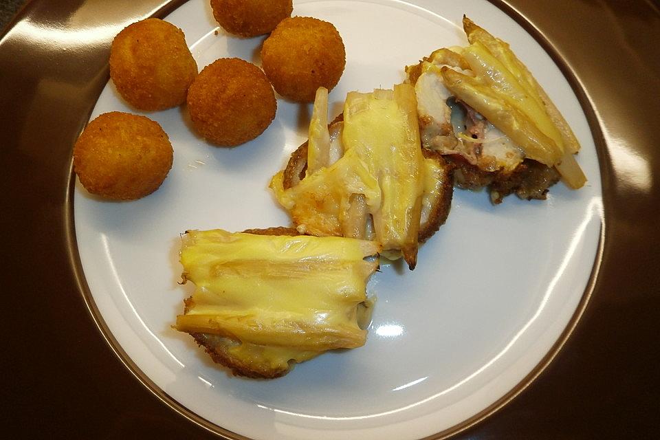 Schnitzel mit Spargel und Käse überbacken