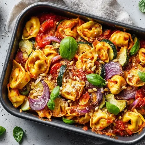 Ravioli mit Gemüse vom Blech – buntes Ofengericht mit Zucchini, Paprika und Parmesan